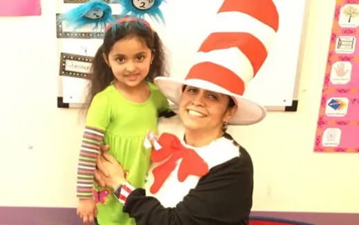 a person holding a child