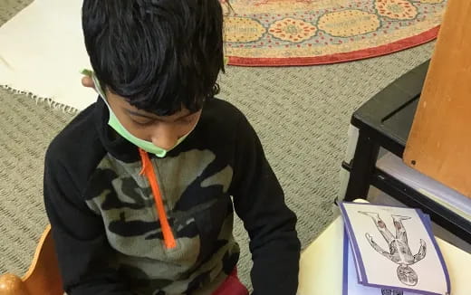 a boy wearing a mask