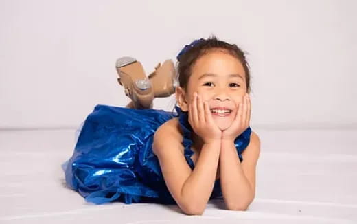a boy lying on the floor