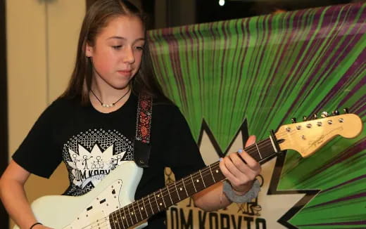 a person playing a guitar