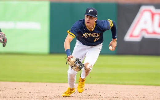a baseball player throwing a ball