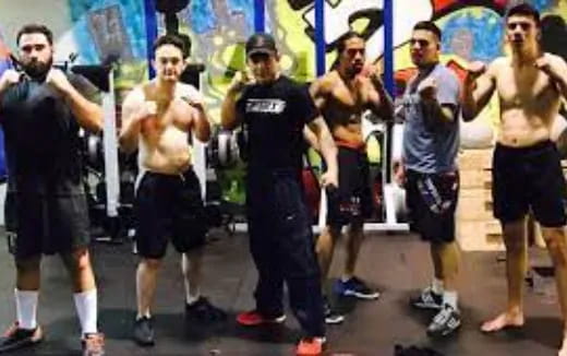 a group of men posing for a picture