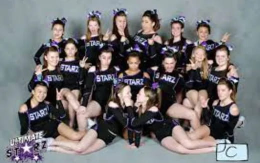 a group of women posing for a photo