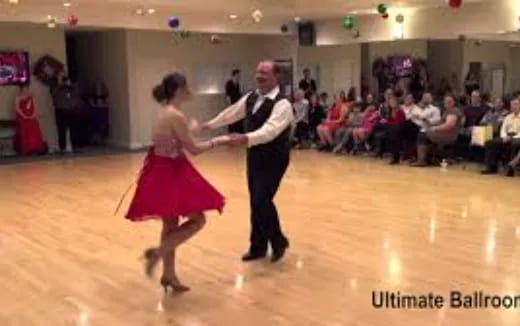 a man and woman dancing