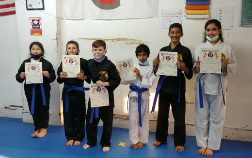 a group of people holding signs