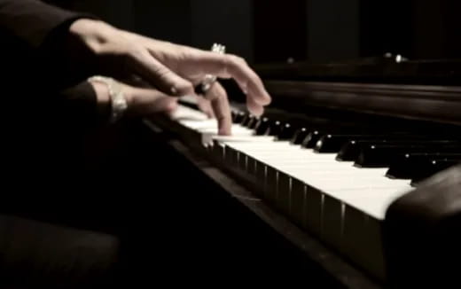 a person playing a piano