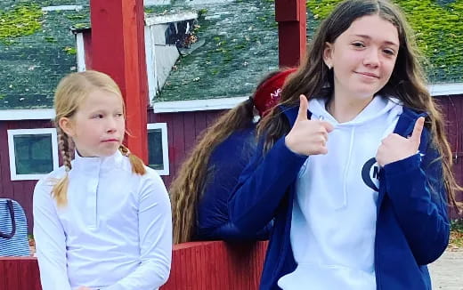 a person and a girl posing for a picture