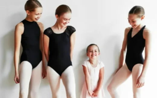 a group of women posing for a picture