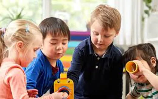 a group of children playing with toys