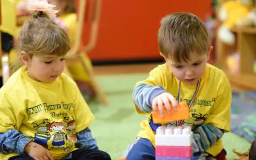 a few young boys playing with toys
