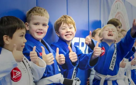 a group of boys in matching outfits