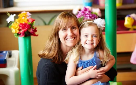 a person holding a child