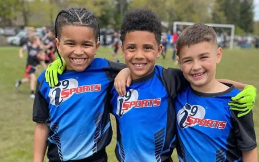 a group of boys smiling