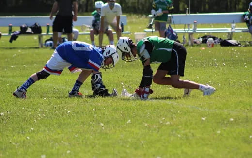 a group of people playing football