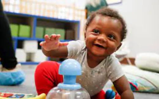 a baby with a bottle