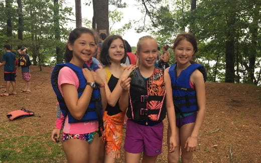 a group of people posing for the camera