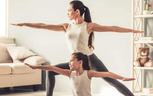 a woman doing a handstand