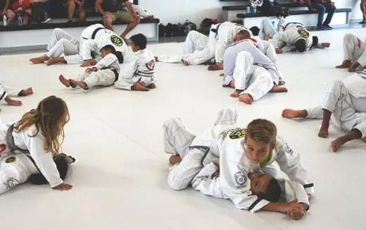a group of people sitting on the floor