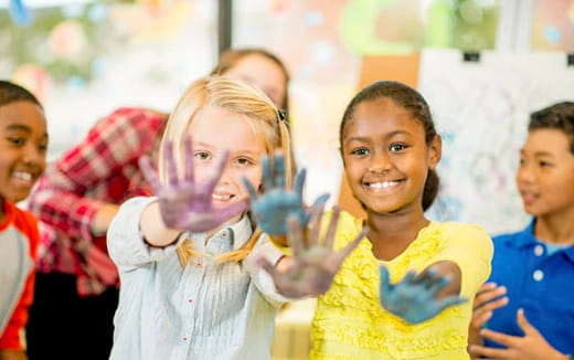 a group of children smiling