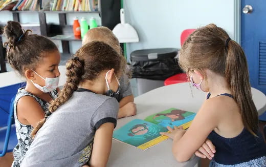 a group of girls painting