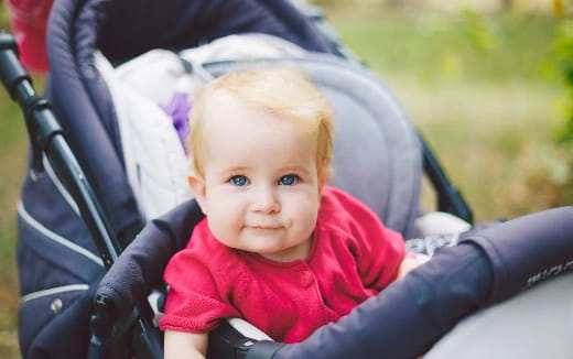 a baby in a stroller