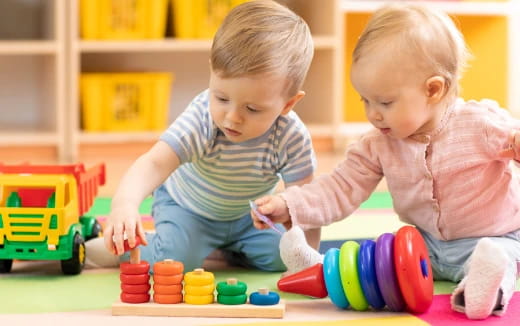 two children playing with toys