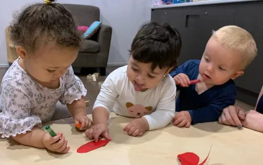 a group of kids playing with toys