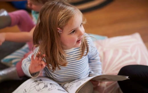 a girl reading a book