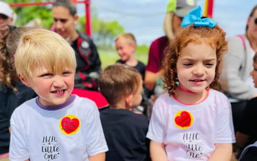 a group of children smiling