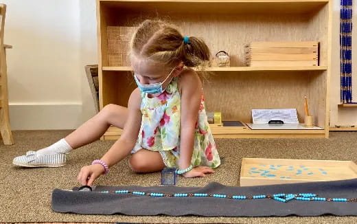a young girl with a stethoscope on her neck