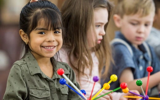 a group of children smiling
