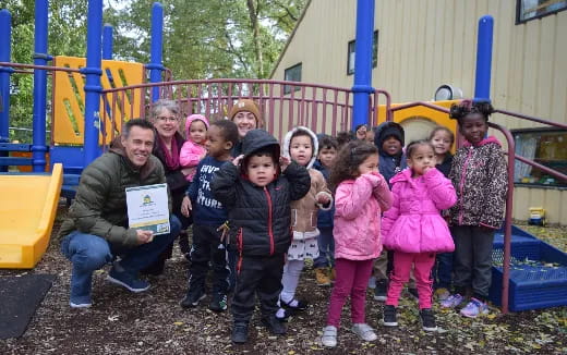 a group of children posing for a photo