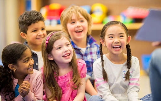 a group of children smiling