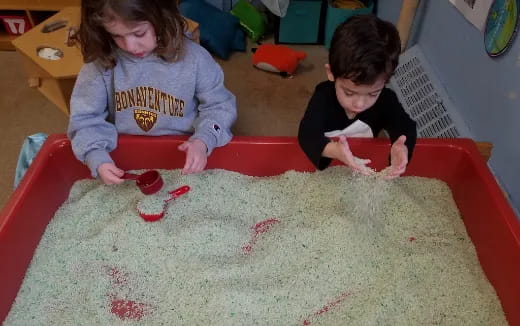 a couple of kids playing with toys