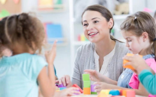 a group of children playing with toys