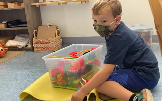 a boy wearing a mask