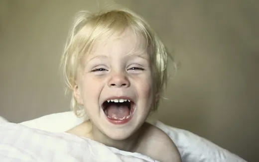 a child with blonde hair