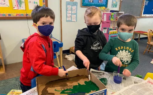 a group of children wearing masks