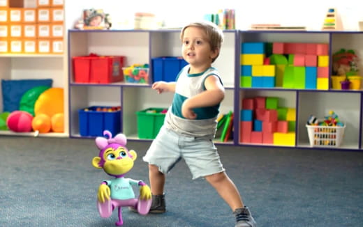 a child holding a toy