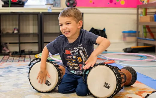 a boy playing drums