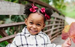 a little girl smiling