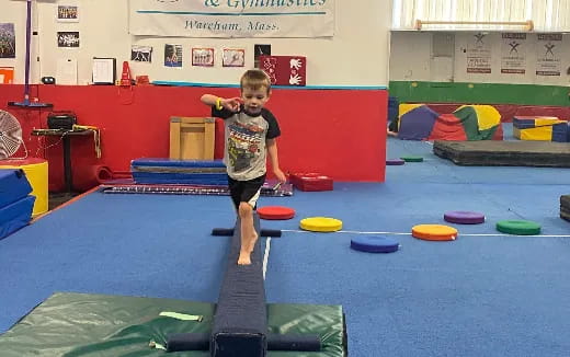 a boy playing with toys