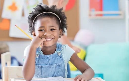 a young girl smiling