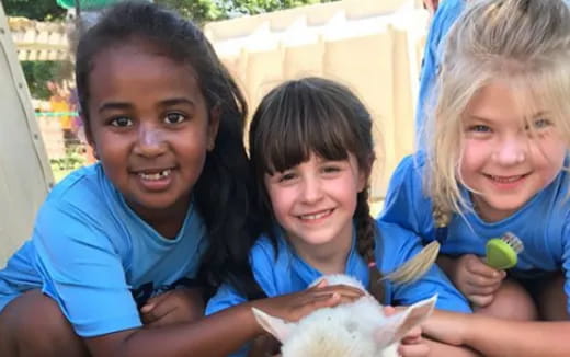 a group of girls smiling