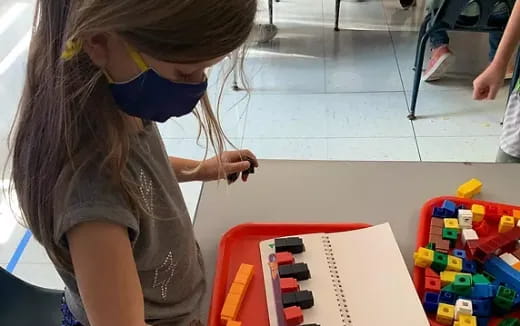 a young girl painting