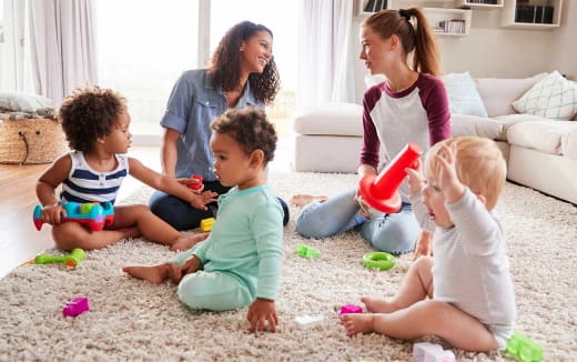 a group of children playing with toys