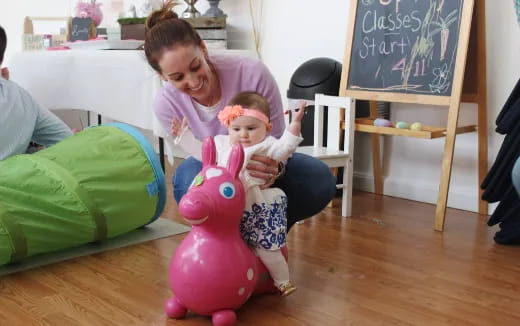 a person holding a baby