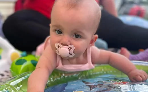 a baby with a pacifier