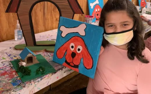 a girl wearing a mask