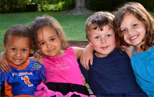 a group of children posing for a photo